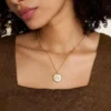 Leo Sutton Zodiac Gold-Tone Stainless Steel Gold Mother-of-Pearl Pendant Necklace